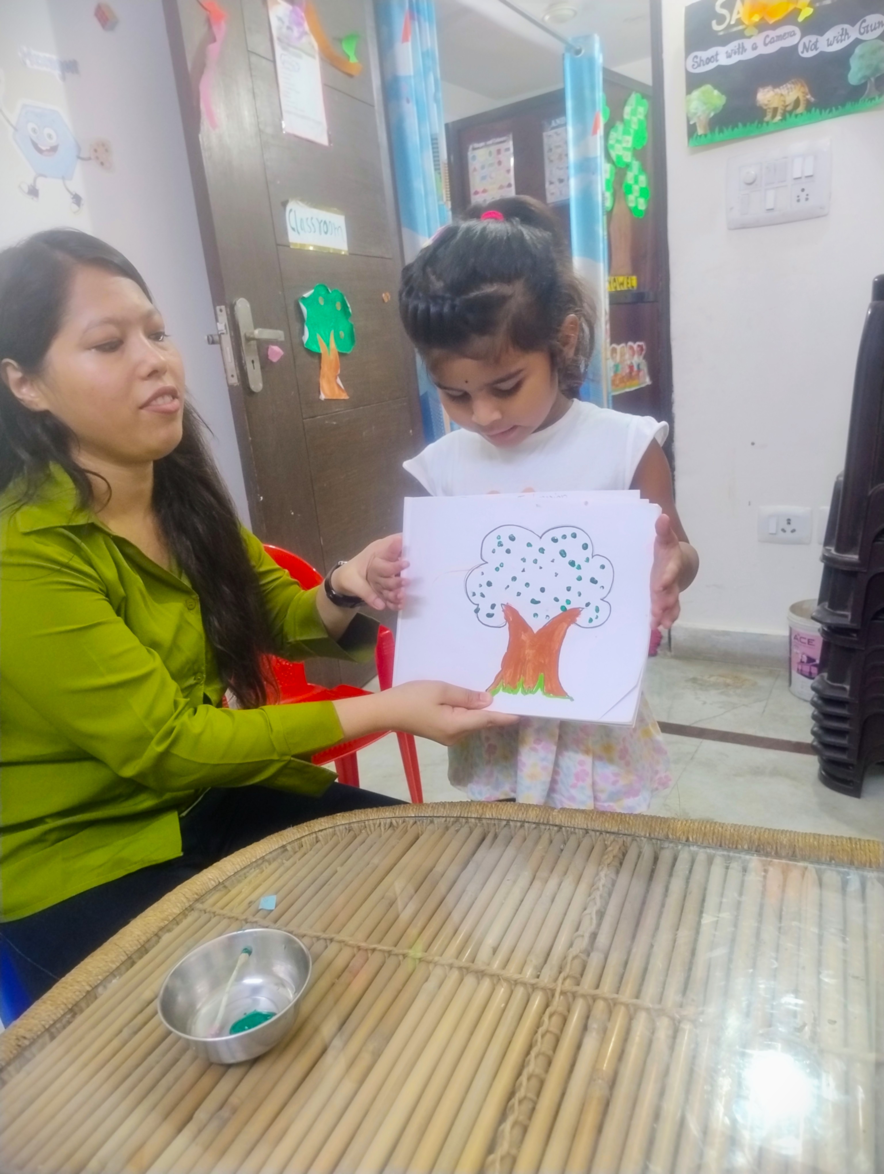 Three children engaged in a learning activity